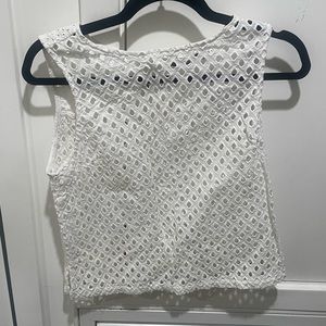 White tank with cut outs